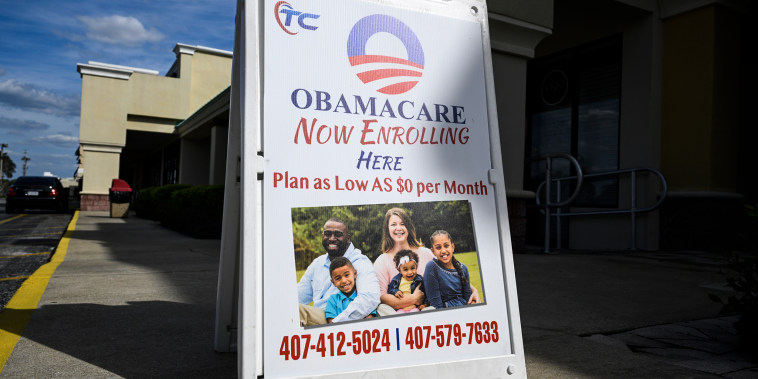 A sign advertising Obamacare health insurance enrollment